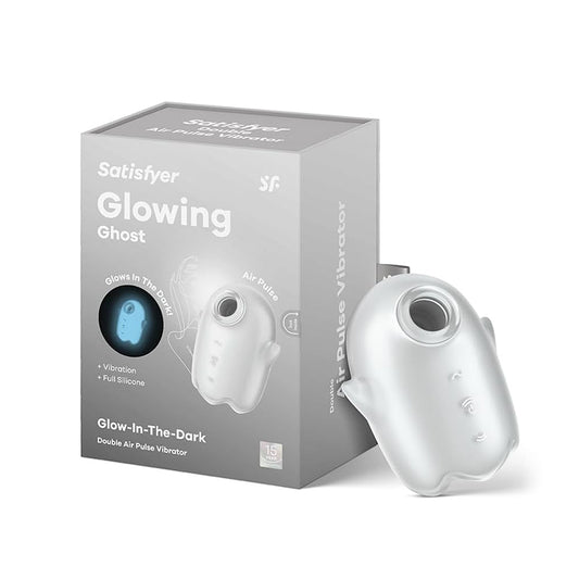 Satisfyer Glowing Ghost lay-on vibrator in white with glow-in-the-dark design and packaging box.