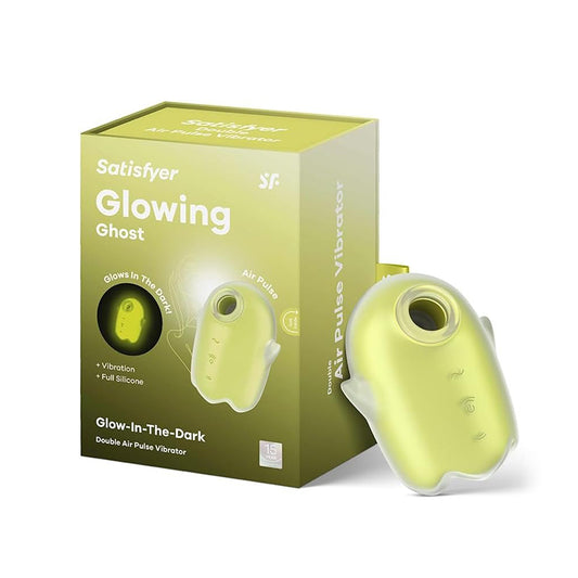 Satisfyer Glowing Ghost lay-on vibrator in neon yellow with glow-in-the-dark design and packaging box.