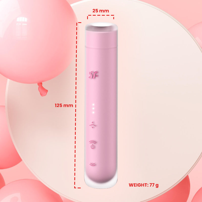 Close-up of Satisfyer First Kiss placed on pink background with measurements indicated.