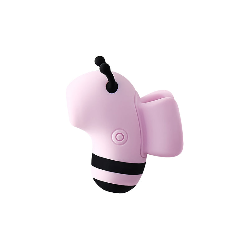Side view of the pink bee-shaped stimulator with antennae and rounded wing on a white background
