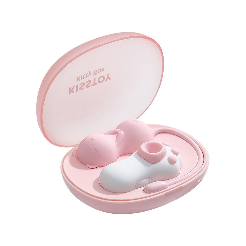 Pink clamshell case with the paw suction unit and egg vibrator inside, angled view