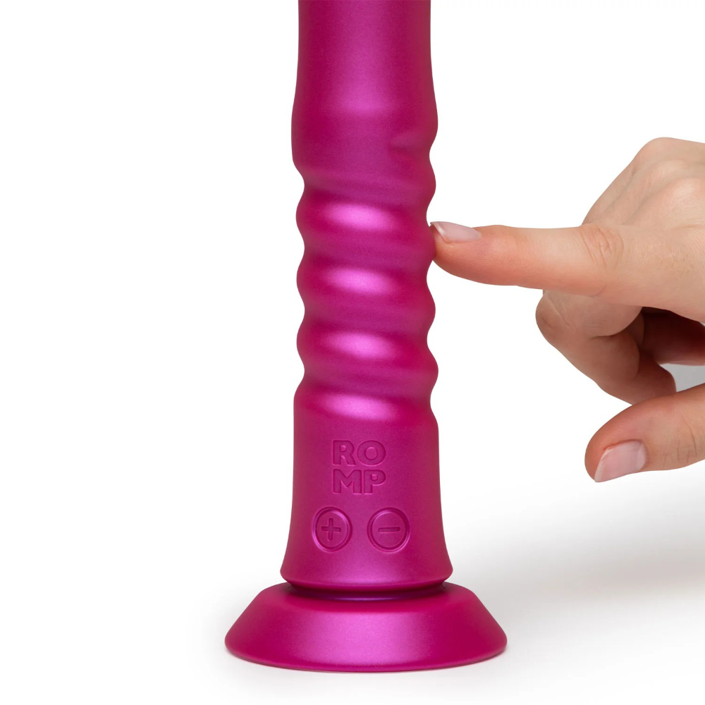 Close-up of control buttons on base being pressed during use