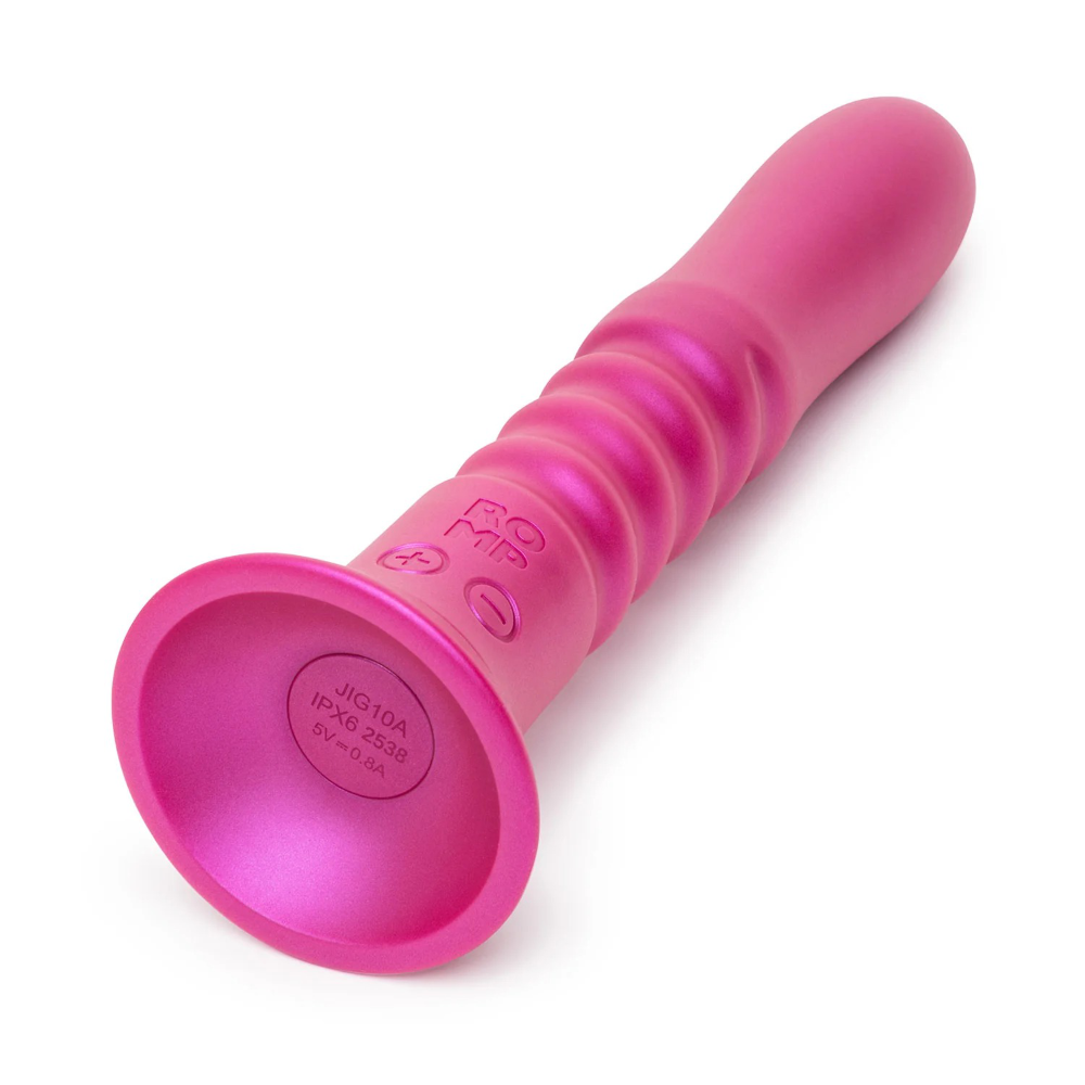 Horizontal view of dildo showing suction cup base and shaft details