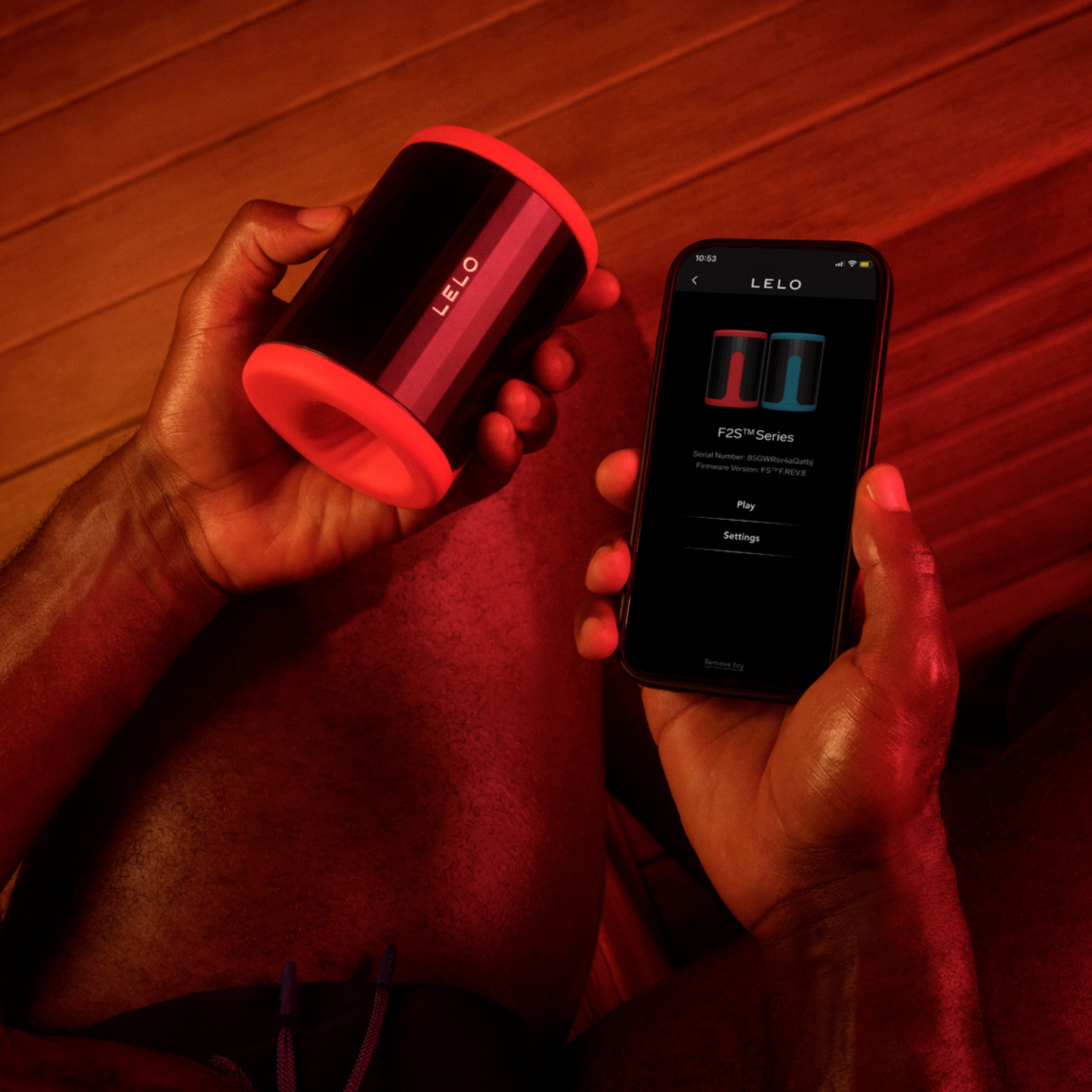 Front view of Lelo F2S red edition retail packaging with sleek black finish.