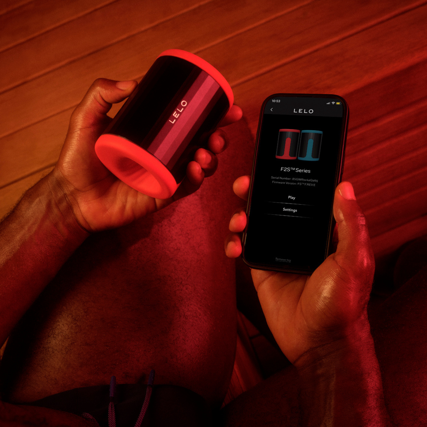 Front view of Lelo F2S red edition retail packaging with sleek black finish.