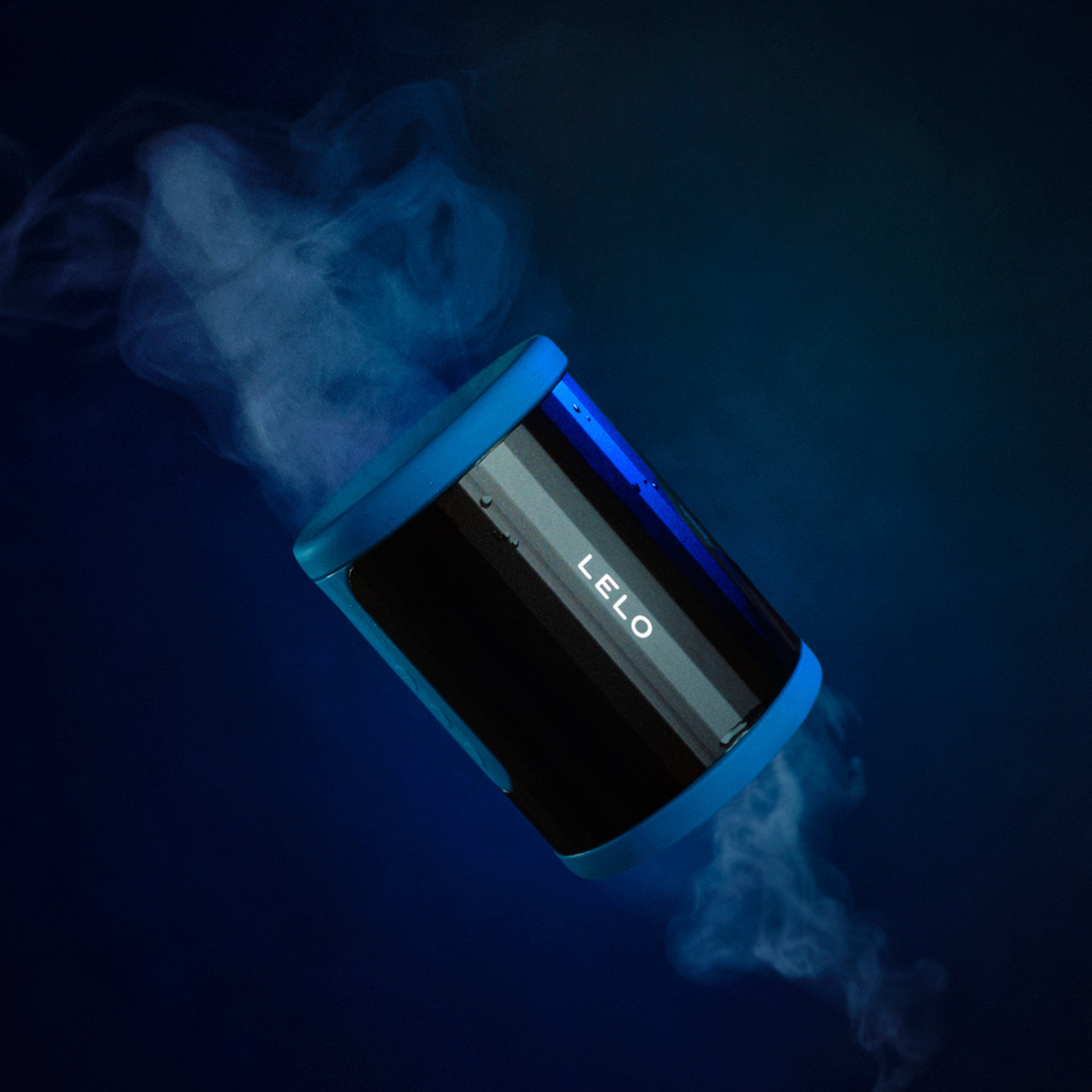 Lelo F2S illuminated with a glowing blue light effect against a dark background.