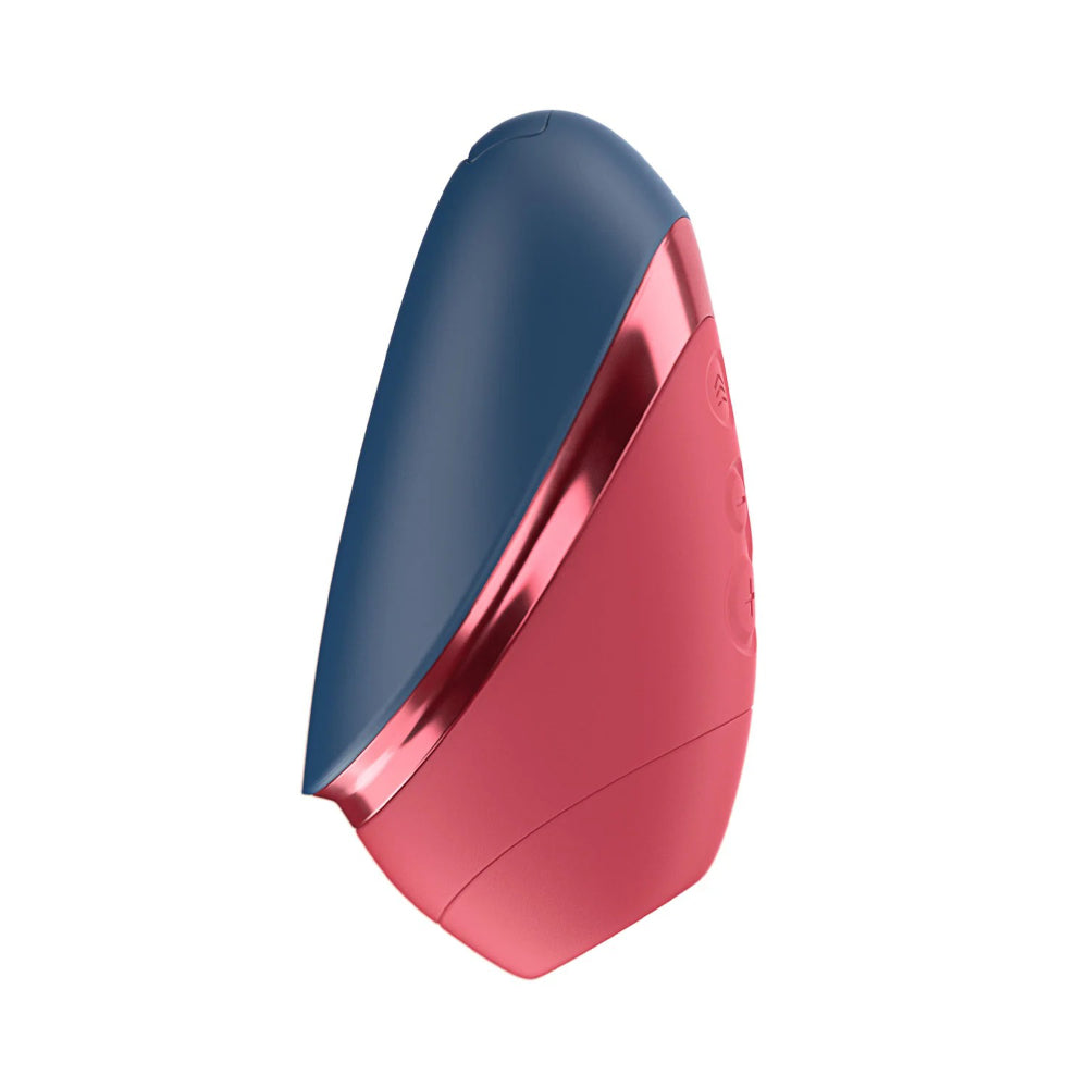 Angled side view of the Womanizer Next Liberty showcasing its sleek curved profile.