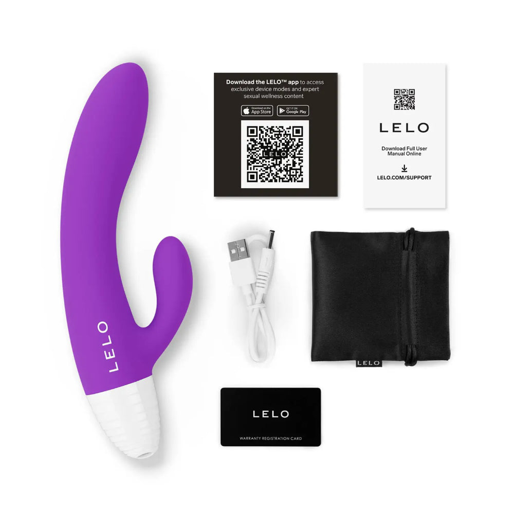 LELO vibrator set including dual stimulator toy, USB charger, pouch, and instructions.