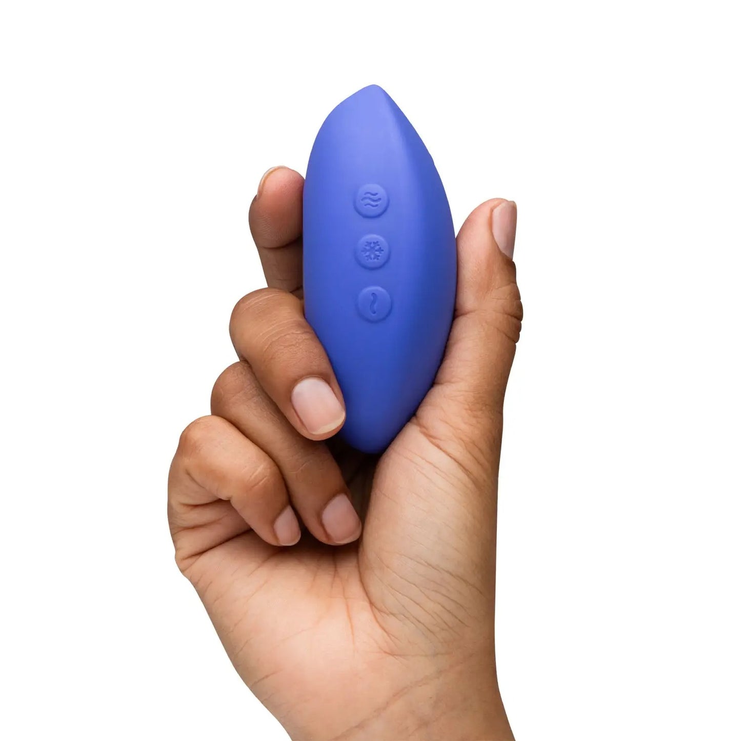 Hand holding We-Vibe Temp lavender blue vibrator showing its compact size.