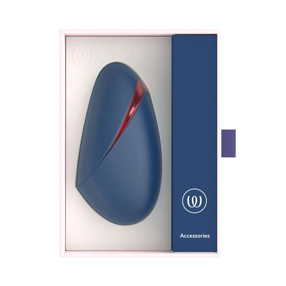 Womanizer Next Liberty displayed beside its premium retail box and official packaging.