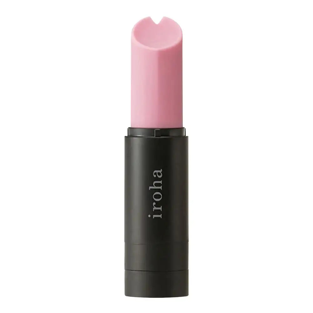 Close-up of pink lipstick-shaped vibrator without cap, sleek and compact design
