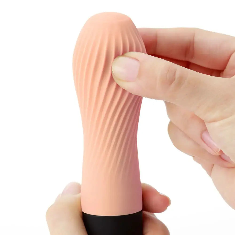 Demonstration of soft silicone material being gently pressed by hand