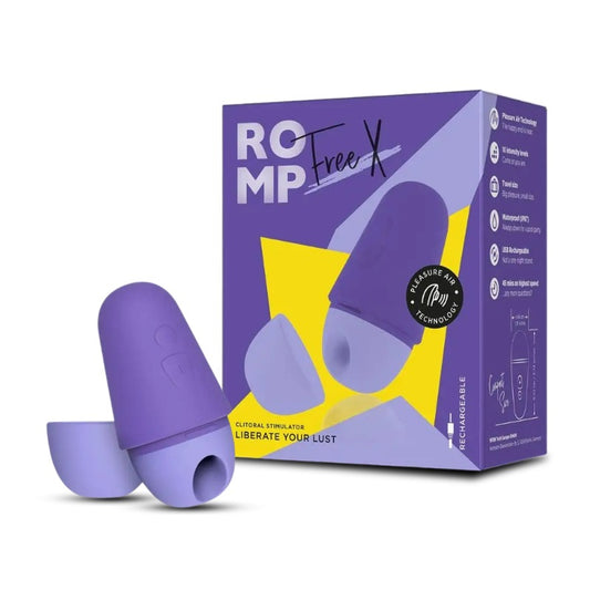 ROMP Free X rechargeable clitoral stimulator in purple with packaging box and accessories.
