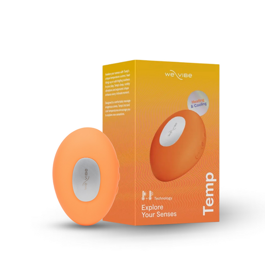 We-Vibe Temp vibrator in bright orange with packaging box shown together.